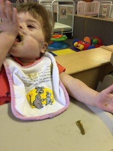 Conor is learning to self-feed with green beans and he loves them!